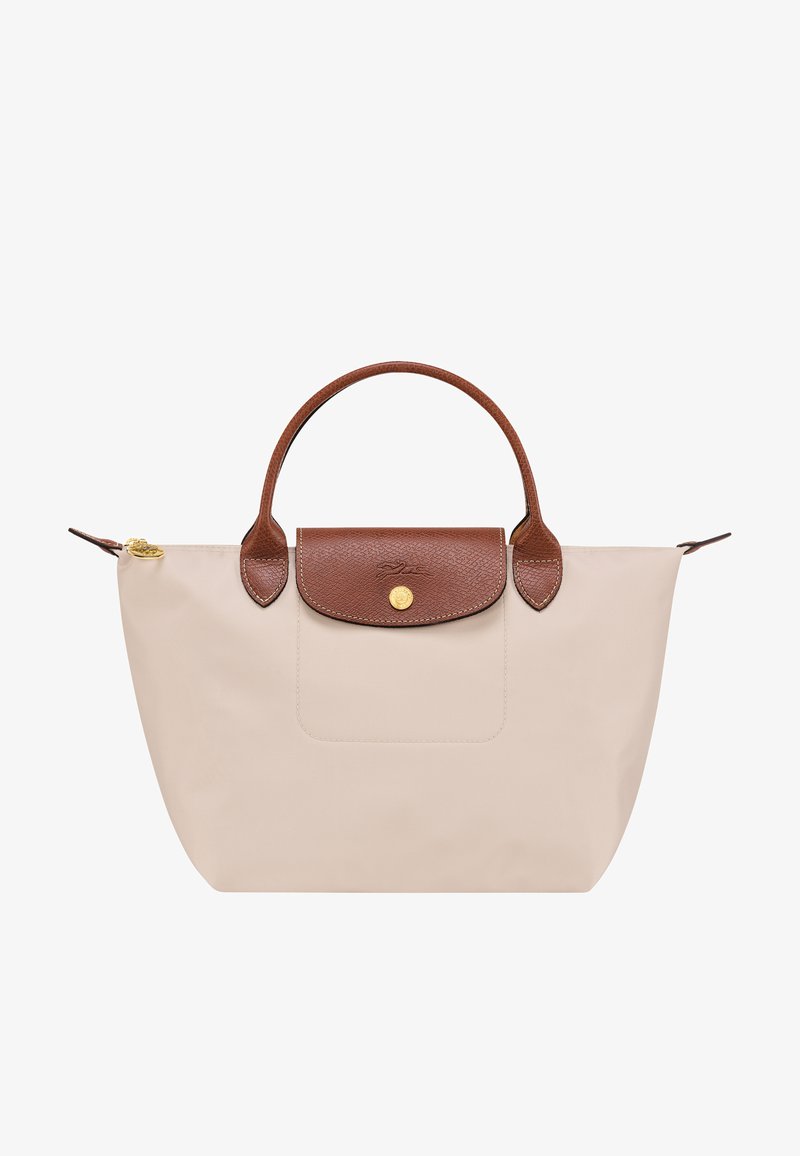 Beige nylon tote bag with a brown leather top flap and handles, featuring a gold button clasp and a front pocket. Smooth texture.