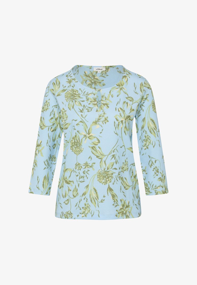 Chemise bleu clair à manches longues avec un motif floral vert et un col rond comportant un petit détail en forme de fente à l'avant.