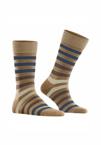 Skarpety w paski w kolorach brązowym, jasnobrązowym i niebieskim. Wykonane z miękkiego materiału, z prążkowanym ściągaczem i wzmocnionym palcem.