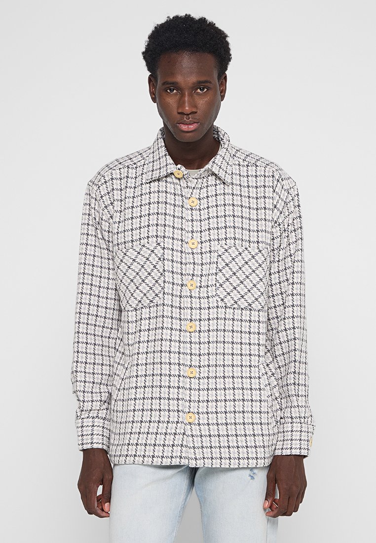 Pegador Lichte jas crème