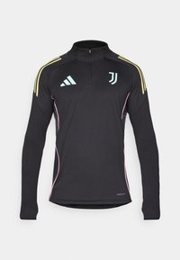 Black long-sleeve training top with a half zip, yellow shoulder stripes, pink side accents, and light blue logo detail on the chest.