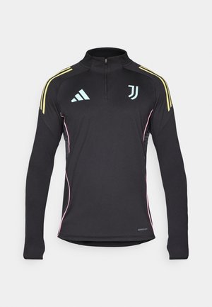 Svart träningströja med långa ärmar och halv dragkedja, gula axelränder, rosa sidodetaljer och ljusblå logotypdetalj på bröstet.