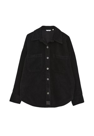 Camicia in corduroy nera con colletto, due tasche frontali, chiusura con bottoni e maniche lunghe. Presenta un tessuto testurizzato e cuciture visibili.
