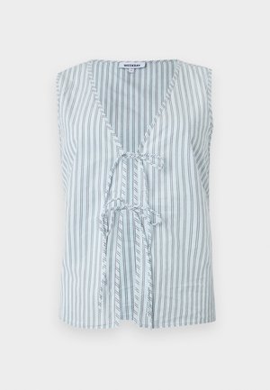 Sleeveless cotton top featuring a V-neck, vertical blue and white stripes, and a front tie detail, offering a relaxed fit.