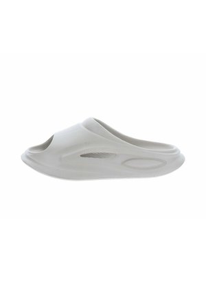 Sandalo slip-on grigio chiaro con punta aperta e suola curva testurizzata, progettato per un uso casual interno o esterno.