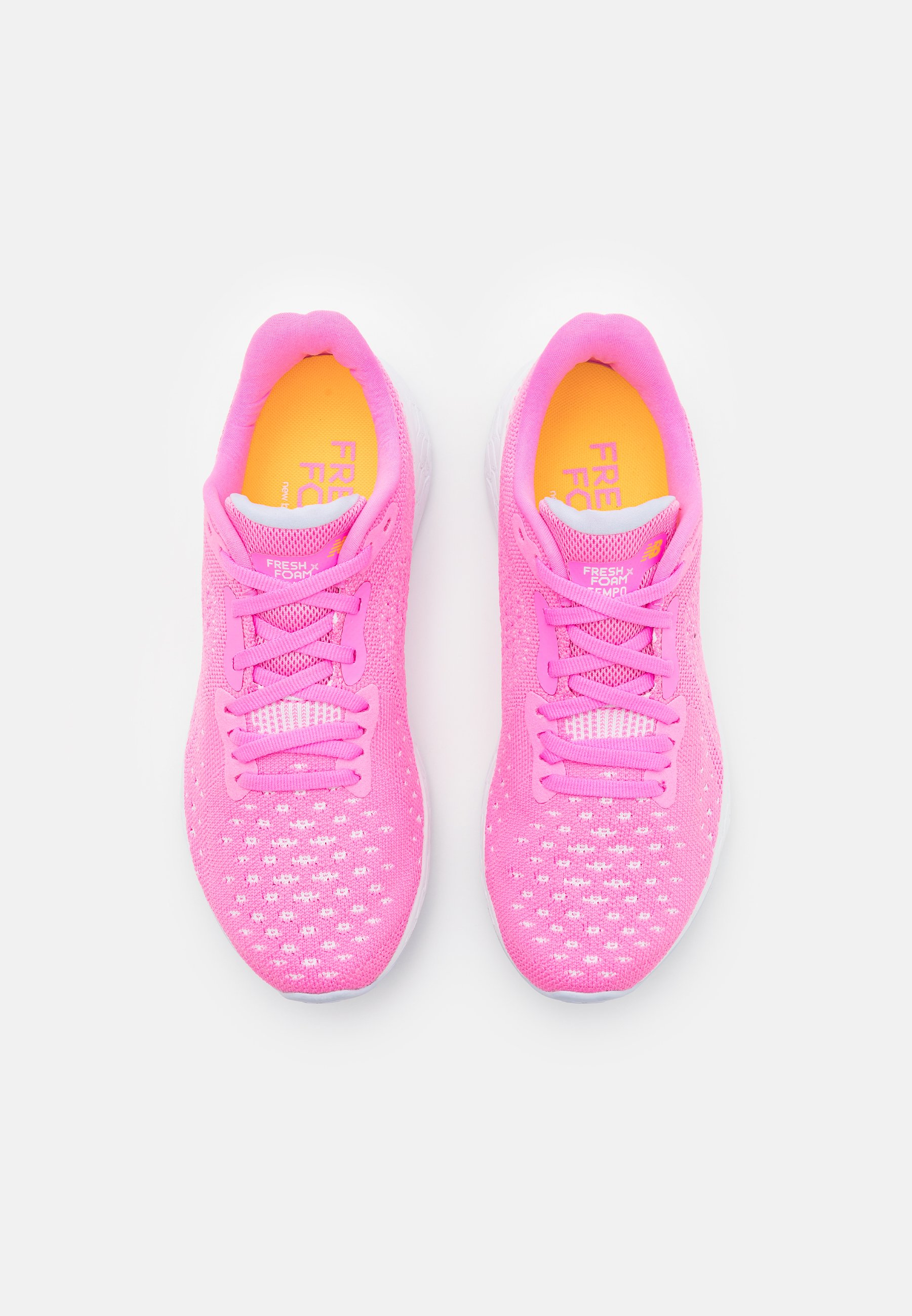 neon pink new balance shoes