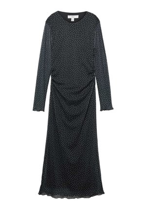 Robe midi noire à manches longues avec des pois blancs, encolure ronde, côtés froncés et ourlets légèrement volantés.