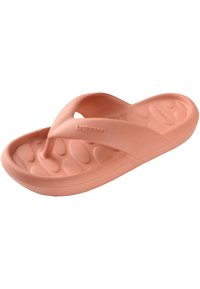 Peach-colored flip-flop sandal made from soft rubber, featuring a textured footbed with oval patterns and a minimalist Y-shaped strap.