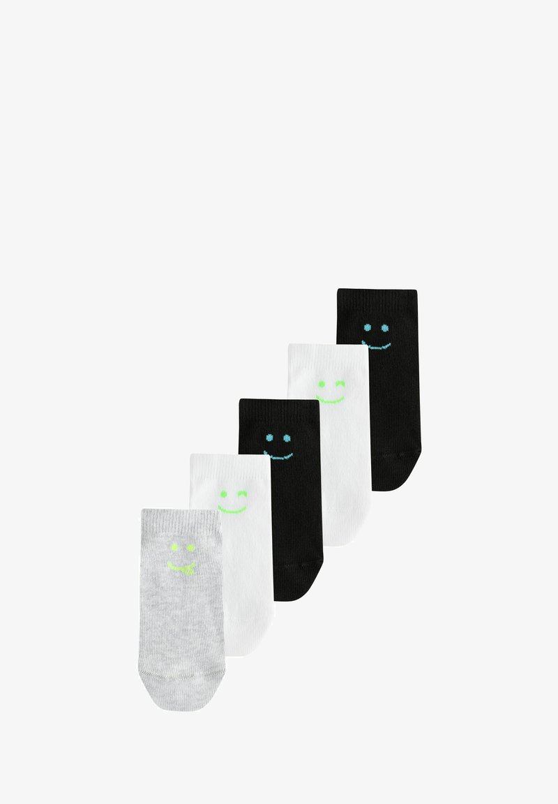 Cinq paires de socquettes en gris, blanc et noir, chacune avec un petit visage souriant vert ou bleu près du haut.