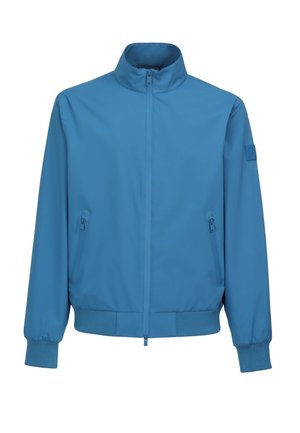 Modra lahka jakna z visokim ovratnikom, sprednjim zadrgo, dvema stranskima žepoma ter elastičnimi manšetami in spodnjim robom. Gladke teksture brez vzorcev.