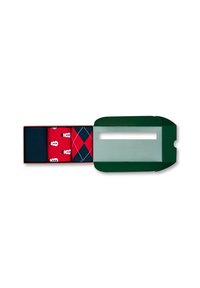 Red gift box with a green lid, featuring three pairs of socks: one red with snowmen, one solid navy, and one argyle in red and navy.