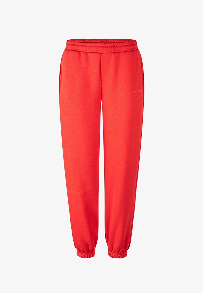 Lyse røde joggingbukser med elastisk talje og manchetter, med sidelommer og subtil branding på højre lår.