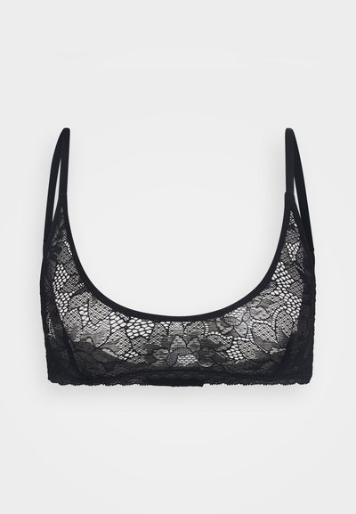 Črna čipkasta bralette s cvetličnim vzorcem, z nastavljivimi tankimi naramnicami in okroglim izrezom. Mehka tekstura z zapletenimi detajli.
