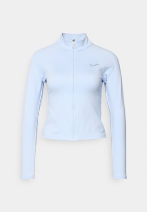 Lichtblauw jack met rits, gemaakt van glad en rekbaar materiaal. Heeft een hoge kraag en een nauwsluitende pasvorm; bevat een klein, zwart Nike-logo op de borst.