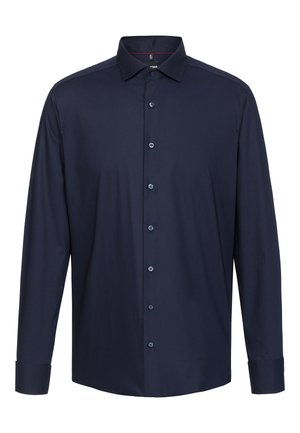 Camicia a maniche lunghe blu navy realizzata in tessuto morbido. Presenta un colletto classico, chiusura con bottoni e bottoni a contrasto.