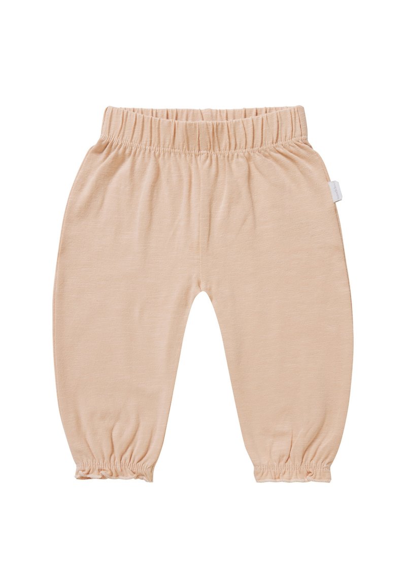 Licht perzikkleurige broek van zachte stof. Voorzien van een elastische tailleband en elastische boorden bij de enkels voor een gatherlook.