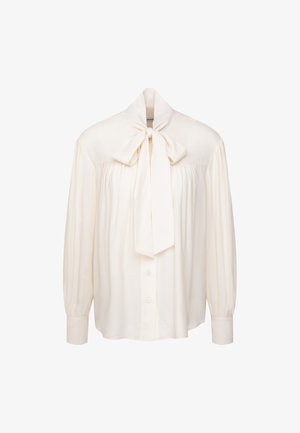 Cremfarbene Bluse mit langen Ärmeln, Knopfleiste, gerafftem Stoff und einer großen gebundenen Schleife am Hals.