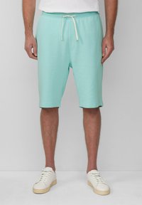 Licht turquoise korte broek van zachte stof, met een elastische tailleband en een trekkoord, met een ontspannen pasvorm die eindigt boven de knie.