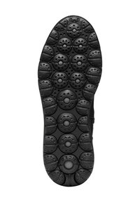Suela de zapato de goma negra con un patrón circular que presenta nodos elevados y orificios de ventilación. Marca "Geox" ubicada en el lateral.