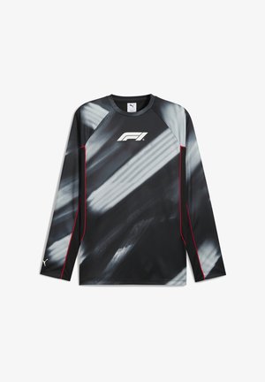 Camisa de manga larga negra con patrón de pinceladas grises, acentos rojos en las costuras y un logo de F1 blanco en el pecho. Fabricada con material transpirable.