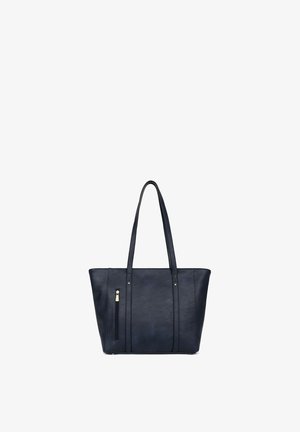 Sac fourre-tout en cuir noir avec de longues poignées doubles et une poche zippée verticale sur le côté gauche avant.