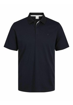 Tumesinine polo särk, mis on valmistatud puuvillast, kraega, lühikeste varrukatega ja millega on vasakul rindkere piirkonnas diskreetne logo. Sujuv tekstuur ja klassikaline sobivus.