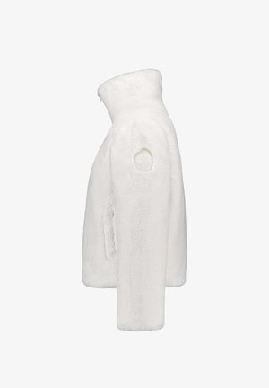 Veste en fausse fourrure blanche avec un col montant, des poches zippées sur les côtés et un logo brodé sur la manche. Texture douce et design à coupe droite.