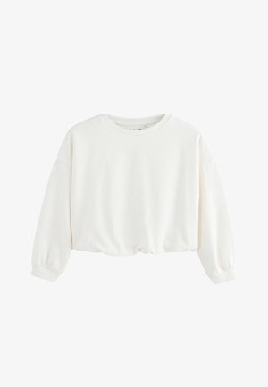 Bluza albă din material moale, cu guler rotund, mâneci lungi bufante și talie elastică pentru un fit lejer.