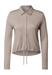 Cardigan beige à manches longues avec un col, une fermeture à boutons à l'avant et un ourlet avec cordon de serrage. Présente un léger scintillement dans le tissu.