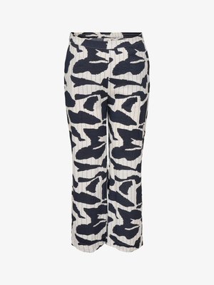 High-waisted, wide-leg pants with black abstract spots on a white background and subtle vertical stripes texture.