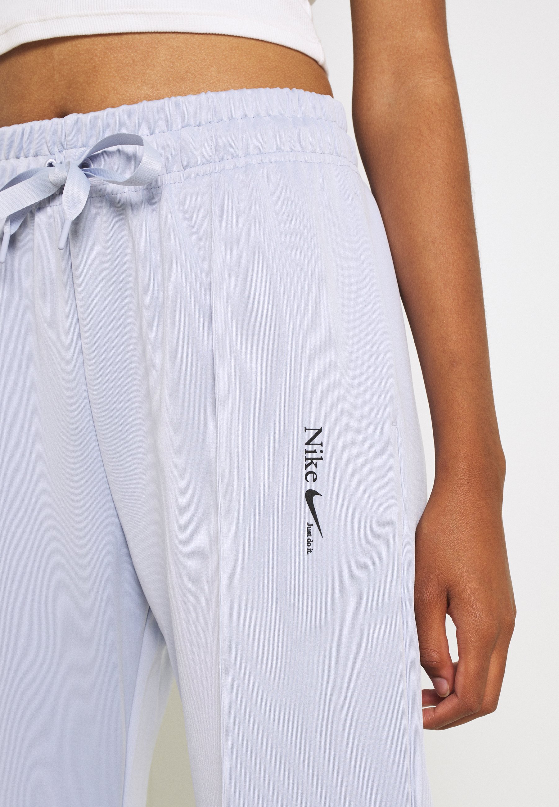 Nike Sportswear TREND PANT - Pantalones deportivos - ghost/lila - Zalando.es