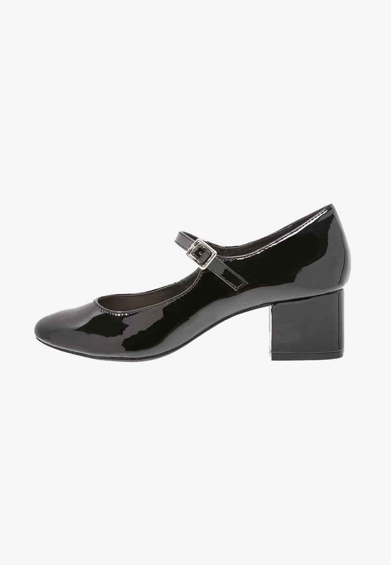 Chaussure Mary Jane en cuir verni noir avec un bout arrondi, une bride à la cheville et un talon bloc. Texture lisse et finition polie.
