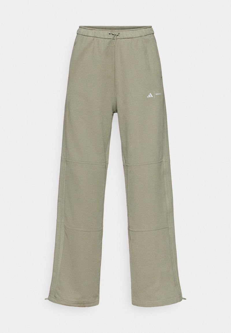 Licht groenachtige wijdvallende sweatpants met een elastische tailleband, trekkoord, knienahts, zijstrepen en een klein logo op het bovenbeen.
