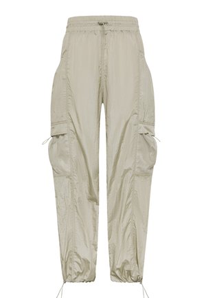 Lichte beige cargobroek met elastische tailleband, trekkoordsluiting, gaaspocketdetails en gerimpelde boorden voor een verstelbare pasvorm.