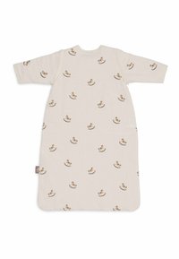 Sac de couchage en coton beige clair avec une texture côtelée, présentant un motif répétitif de chevaux à bascule. Manches longues et encolure arrondie.