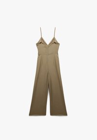 Khaki-Overall mit dünnen verstellbaren Trägern, tailliertem Oberteil und weitem Bein, aus weichem, leichtem Stoff mit glatter Textur gefertigt.