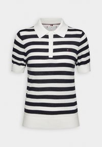 Polo à manches courtes à rayures horizontales noires et blanches, col blanc, patte de boutonnage, et petit logo Tommy Hilfiger sur la poitrine.
