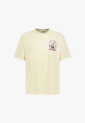 Short beige T-shirt with round neck and small front print of a rooster, surfboard, and text "High Tides Good Vibes Rooster Break."