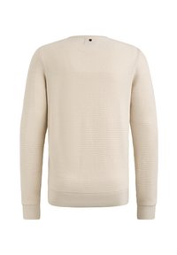 Pull crème avec un design texturé en maille gaufrée. Présente des manches longues, un col rond, et des poignets et un ourlet côtelés.