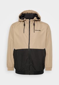 JJERUSH HOOD - Übergangsjacke - coriander/black