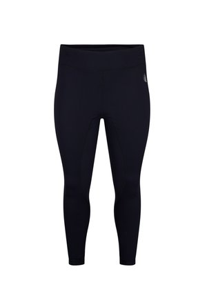 Black leggings made of stretchy fabric, featuring a high waist and seamless design. Stitching details are visible along the legs.