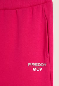 Freddy Pantalones deportivos - beetroot purple