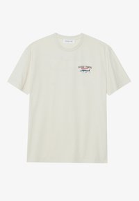 Light cream cotton t-shirt with short sleeves. Features a small blue and red graphic of a marlin and "MARLIN TROPHY" text.