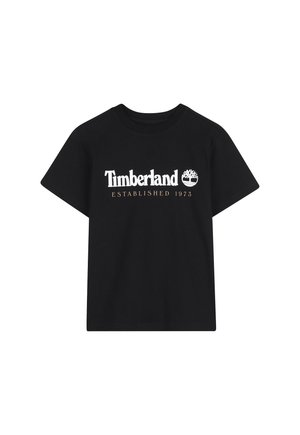 T-shirt noir à manches courtes avec col rond, logo Timberland blanc et icône d'arbre, avec le texte "Established 1973" en beige en dessous.