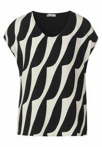 Blusa en blanco y negro con patrón ondulado, escote redondo, mangas cortas y tejido suave. Corte recto con detalles mínimos de costura.
