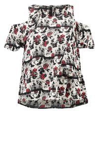 Haut floral épaules dénudées avec un motif texturé blanc, noir et rouge, comprenant des manches courtes et une fermeture éclair au dos.