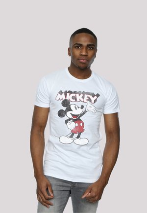 White cotton t-shirt featuring a vintage Mickey Mouse print in red and black, with a round neckline and short sleeves.