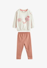 Valittu, tan brown wadded character