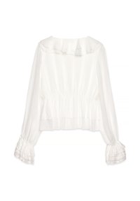 Blusa blanca con cuello con volantes y cintura elástica. Presenta mangas largas con puños con volantes y un tejido ligero y texturizado.
