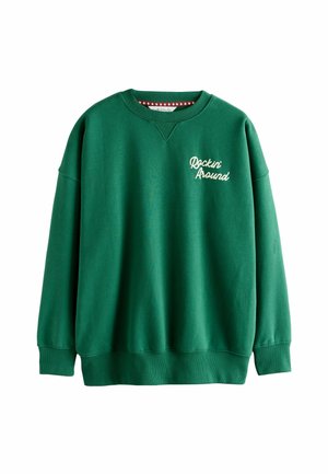 Hanorac verde cu gât rotund și mâneci lungi. Prezintă un text brodat "Rockin' Around" în alb pe partea din față. Textură de țesătură moale.